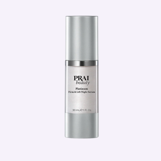 PRAI Beauty Platinum Night Caviar Firm & Lift Serum in 50ml bottle, showcasing the sleek packaging and luxurious product.