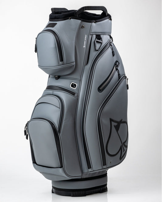 Player Preferred™ Cart Bag by Pins and Aces in Flat Ash, featuring multiple compartments and a sturdy golf bag design.