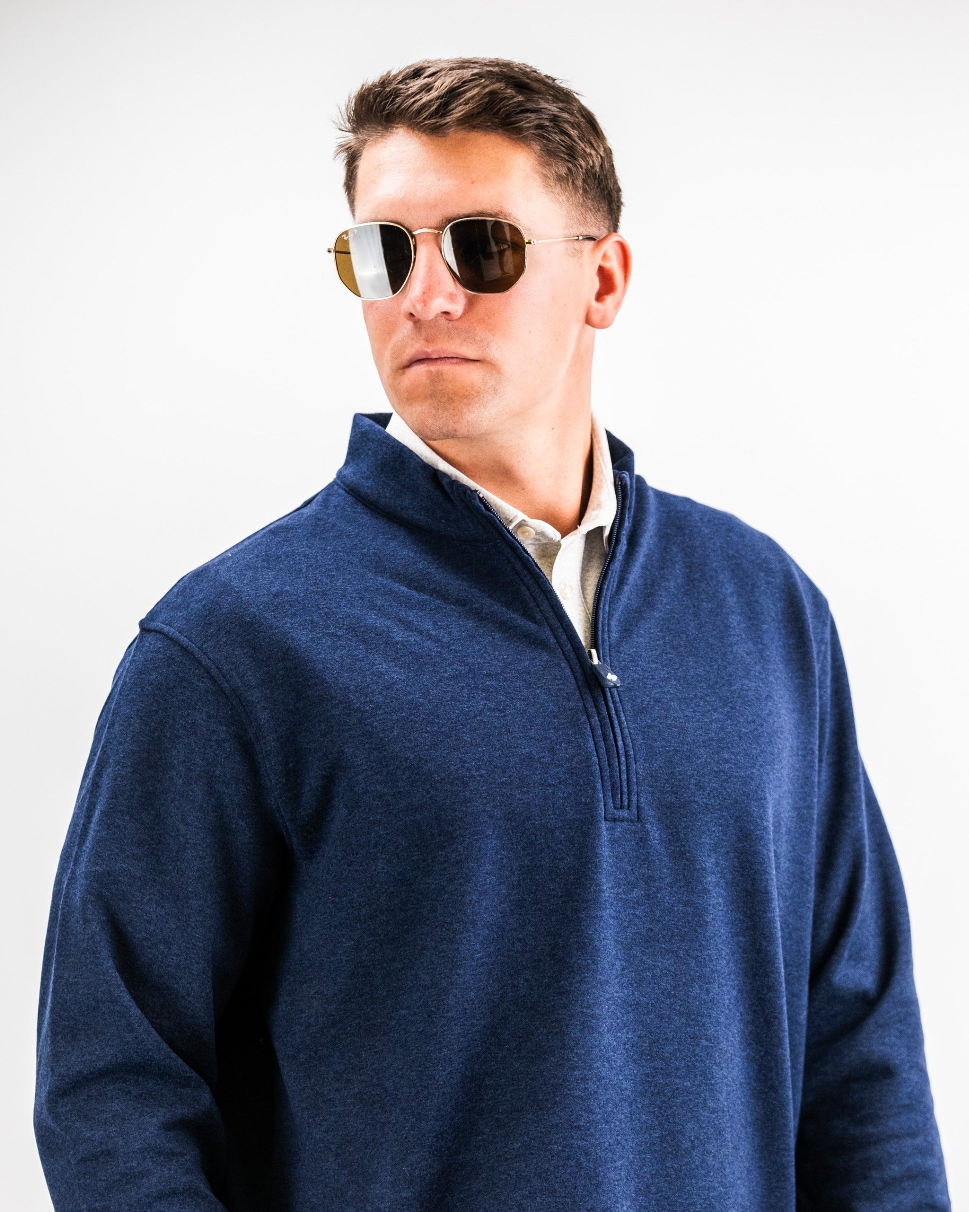 Men's Heathered Navy Player Preferred™ Pullover by Pins and Aces, showcasing a comfortable, stylish men’s outerwear with a textured knit design.
