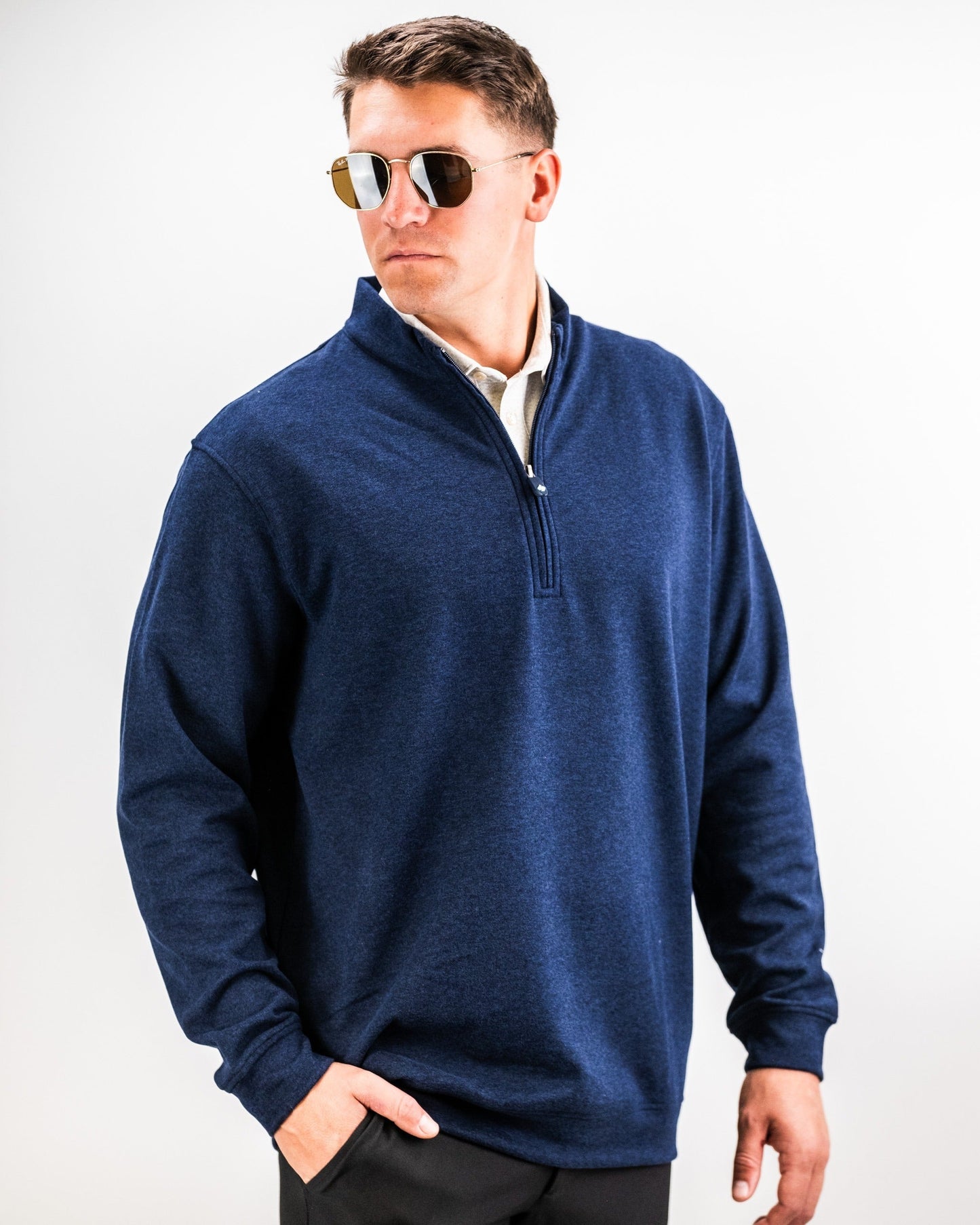 Men's Heathered Navy Player Preferred™ Pullover from Pins and Aces, men's outerwear with a comfortable, casual fit.