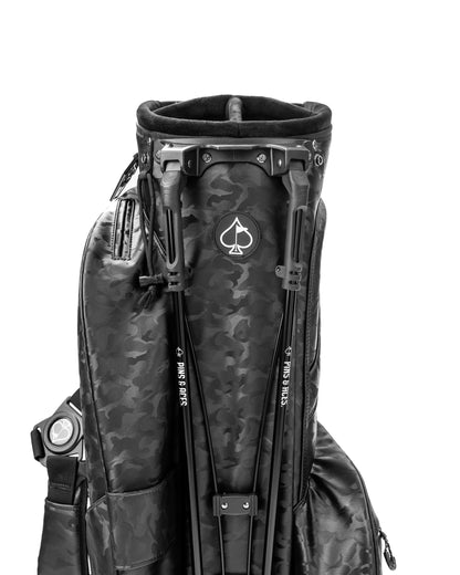 Black camo Player Preferred™ golf bag by Pins and Aces with multiple compartments and padded straps for comfortable carrying.