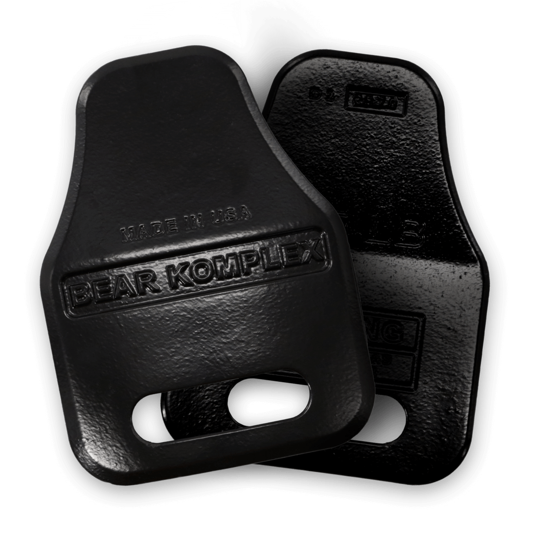 Pair of Bear KompleX weight vest plates in black, designed for weight vest training and fitness workouts.