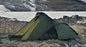 Snugpak Scorpion Tent set up outdoors, showcasing durable fabric, rainfly, and mesh windows for camping and outdoor adventures.
