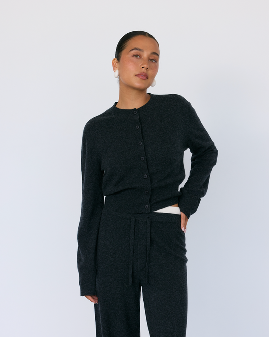 Artless Forever Tove Cashmere Cardigan in soft knit, shown folded with a close-up of the luxurious fabric texture.