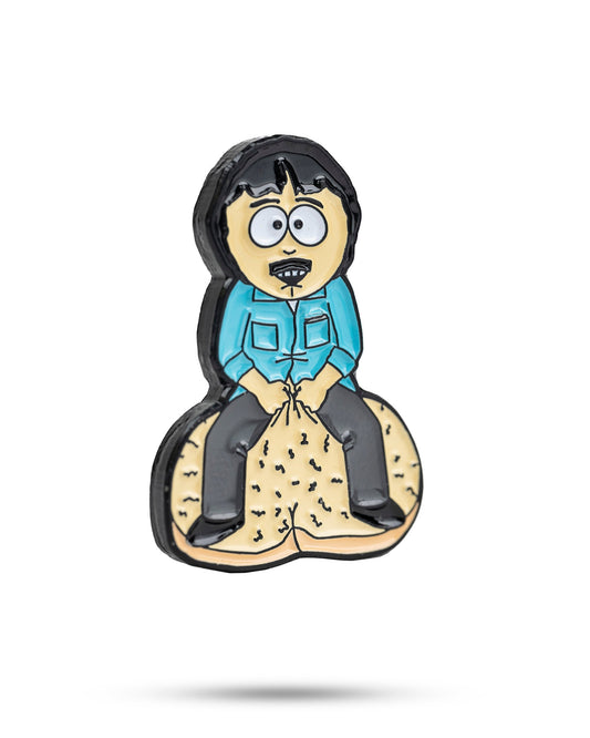 South Park Randy ball marker from Pins and Aces, featuring a cartoon image of Randy on a metal golf accessory.