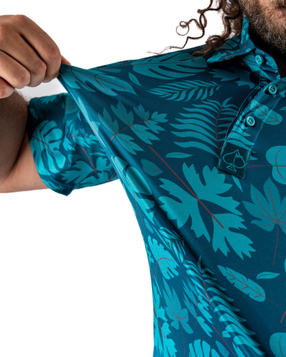 Men's Pins and Aces Cabana Nights polo shirt with a tropical print, relaxed fit, perfect for casual summer and golf attire.