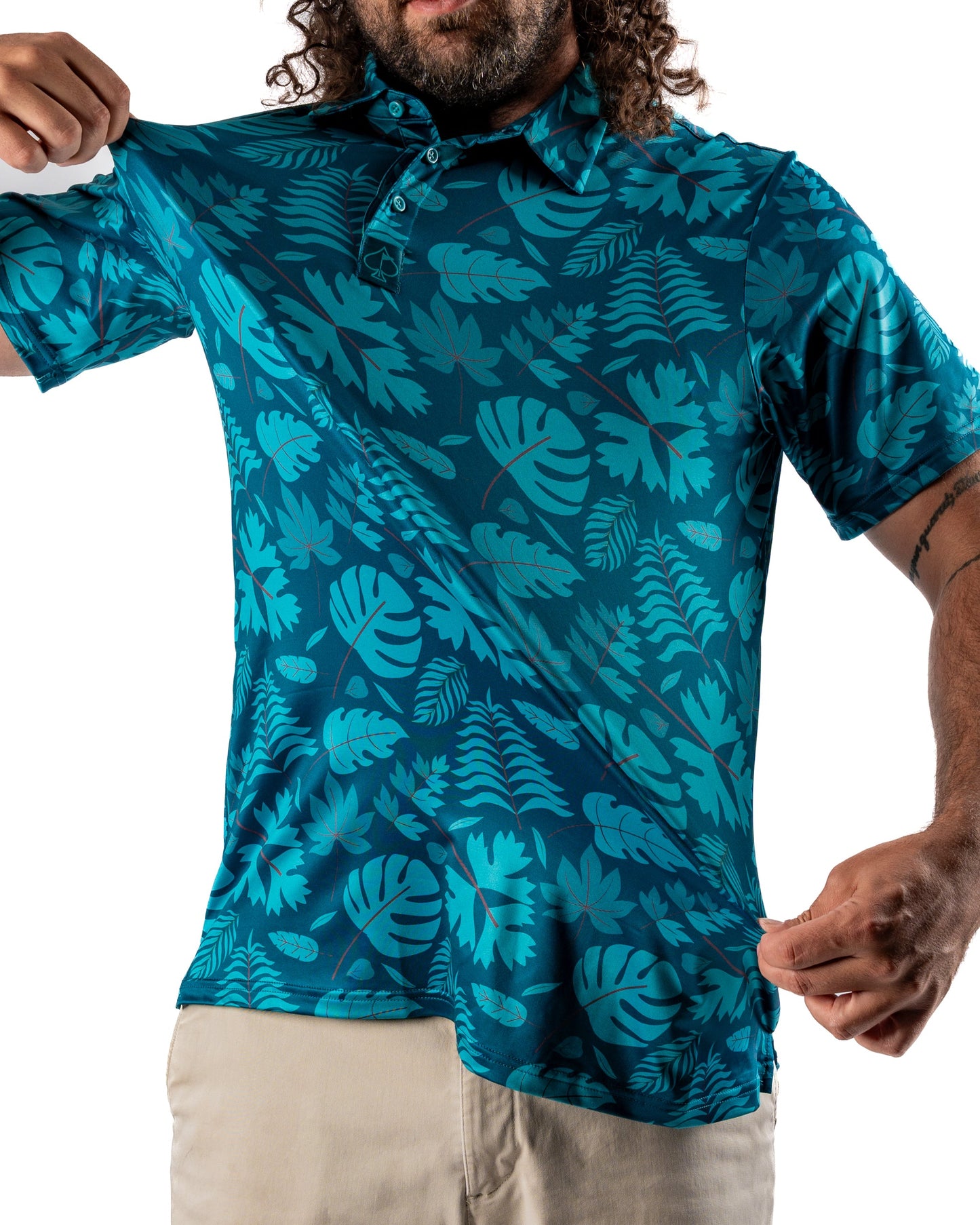 Men's Cabana Nights polo shirt by Pins and Aces featuring a vibrant tropical pattern and classic polo design.