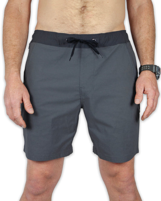 Men's Thunderbird Short in Dark Shadow by Off The Grid Surplus, showing the stylish dark-colored men's shorts with functional pockets.