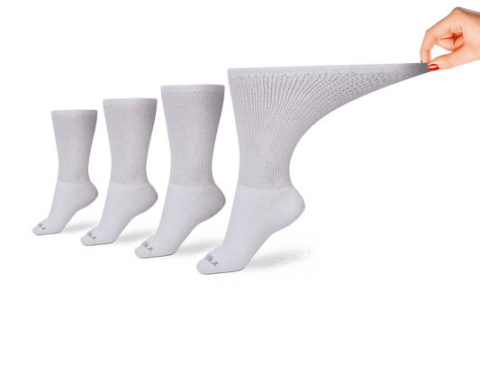 Pair of women's ultra-soft upper calf socks by DSC in white.
