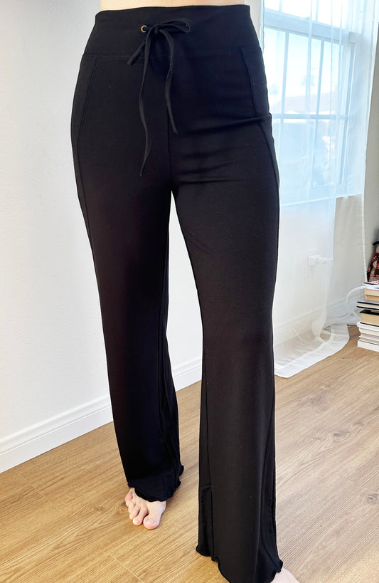 Women’s bamboo viscose yoga pants by Spun Bamboo, comfortable and stretchy, shown in a relaxed fit on a model.