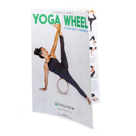 Yoloha Yoga brand yoga wheel guide book showing illustrations and tips for practicing yoga wheel poses and stretches.