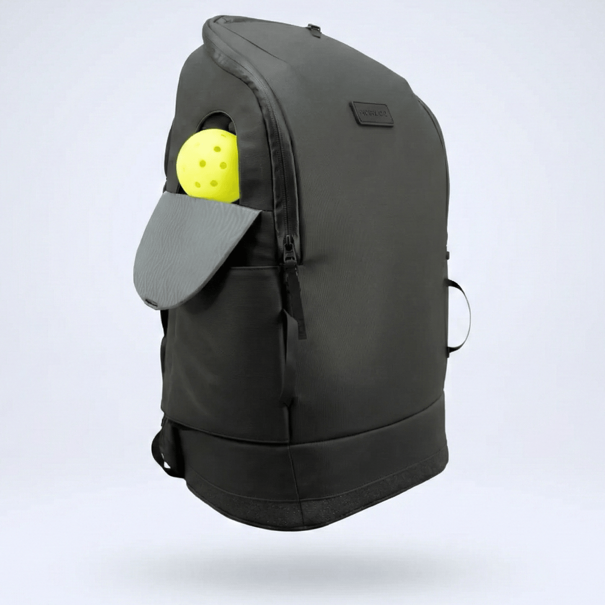 Black FORWRD Court Caddy pickleball bag with multiple compartments and padded straps, designed for easy carrying of pickleball gear.