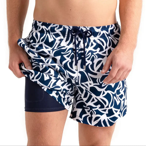 Men's blue hybrid shorts with compression lining and print detail, featuring a stylish design from Capelle Miami.