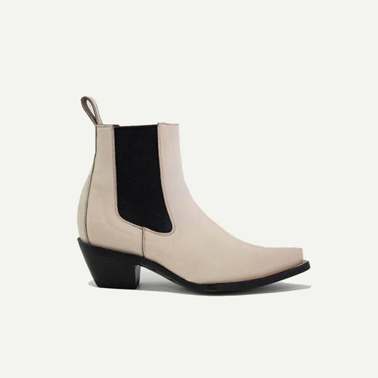 M-O-NINE Sandra Boot in Bone with sleek leather design, rounded toe, and ankle-high silhouette for versatile style.