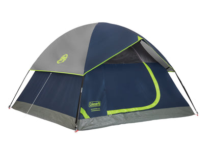 Coleman Sundome Tent set up outdoors, featuring durable fabric, mesh windows, and a spacious interior for camping adventures.
