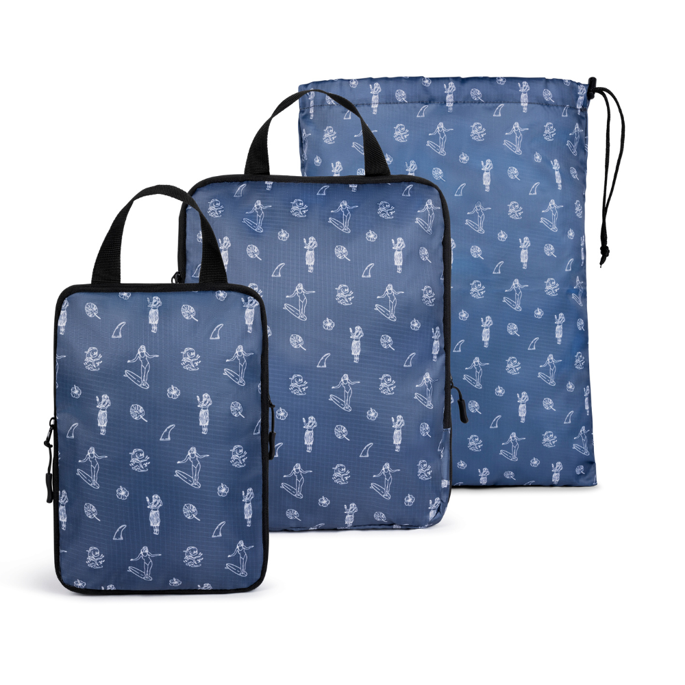 Blue COR Surf compression packing cube set with three versatile accessories for organized travel storage.