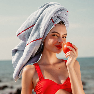 Deia Australian cotton bath towel from Italic, soft and plush home bedding accessory, in a rich tomato color.