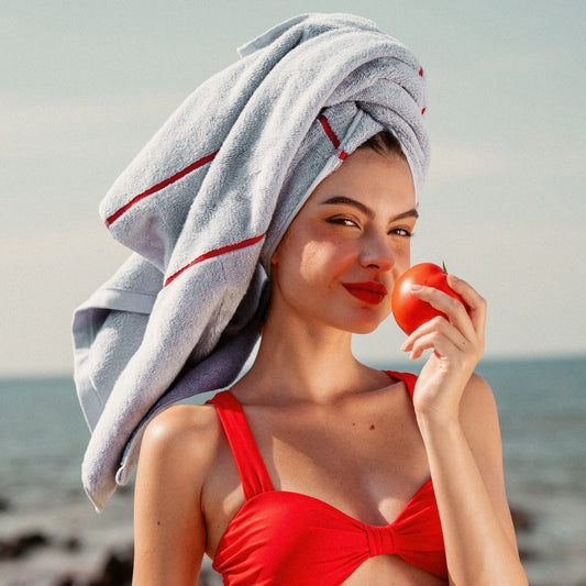Deia Australian cotton bath towel from Italic, soft and plush home bedding accessory, in a rich tomato color.