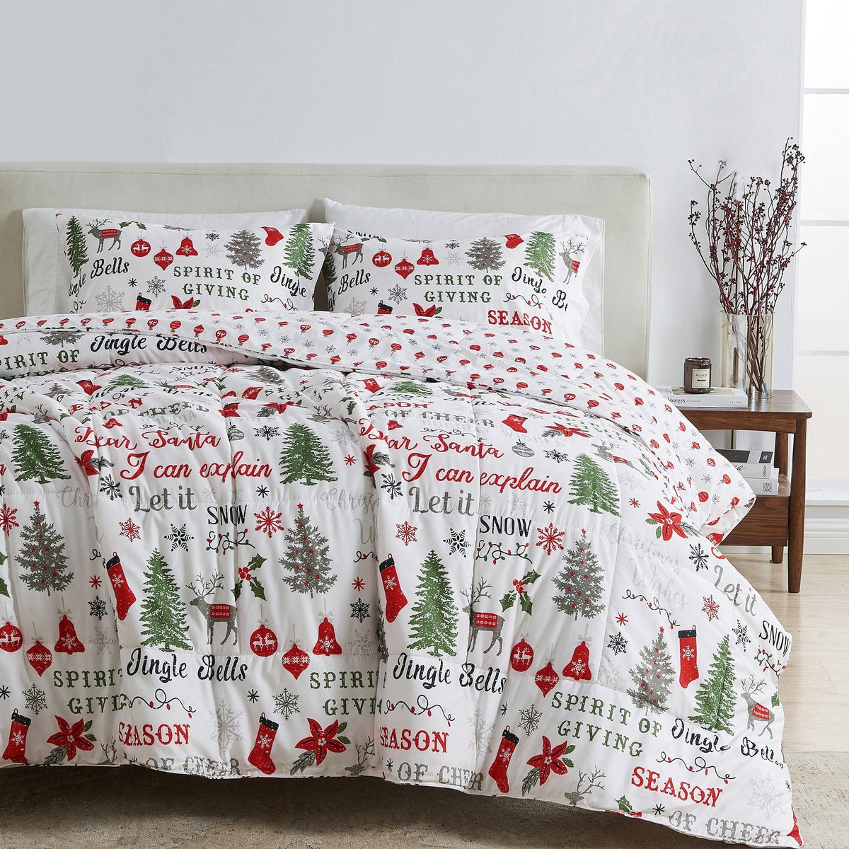 Reversible Christmas comforter and sham set from Great Bay Home's Odette Collection, featuring holiday lodge-style quilted bedding.
