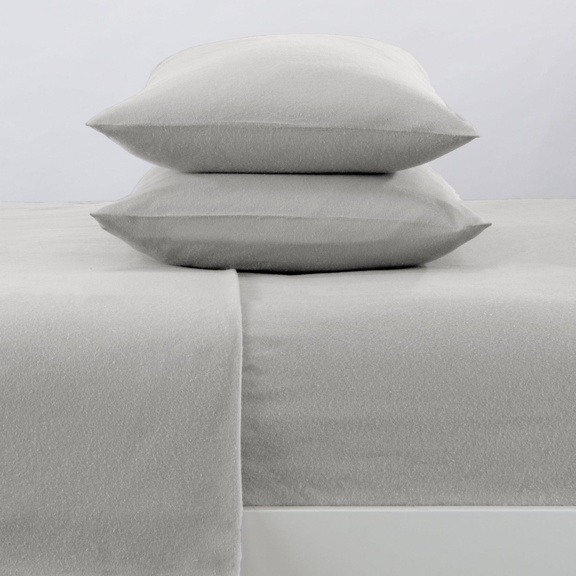 Four-piece set of soft cotton solid flannel sheets from Great Bay Home's Nordic Collection, featuring a cozy, warm design.