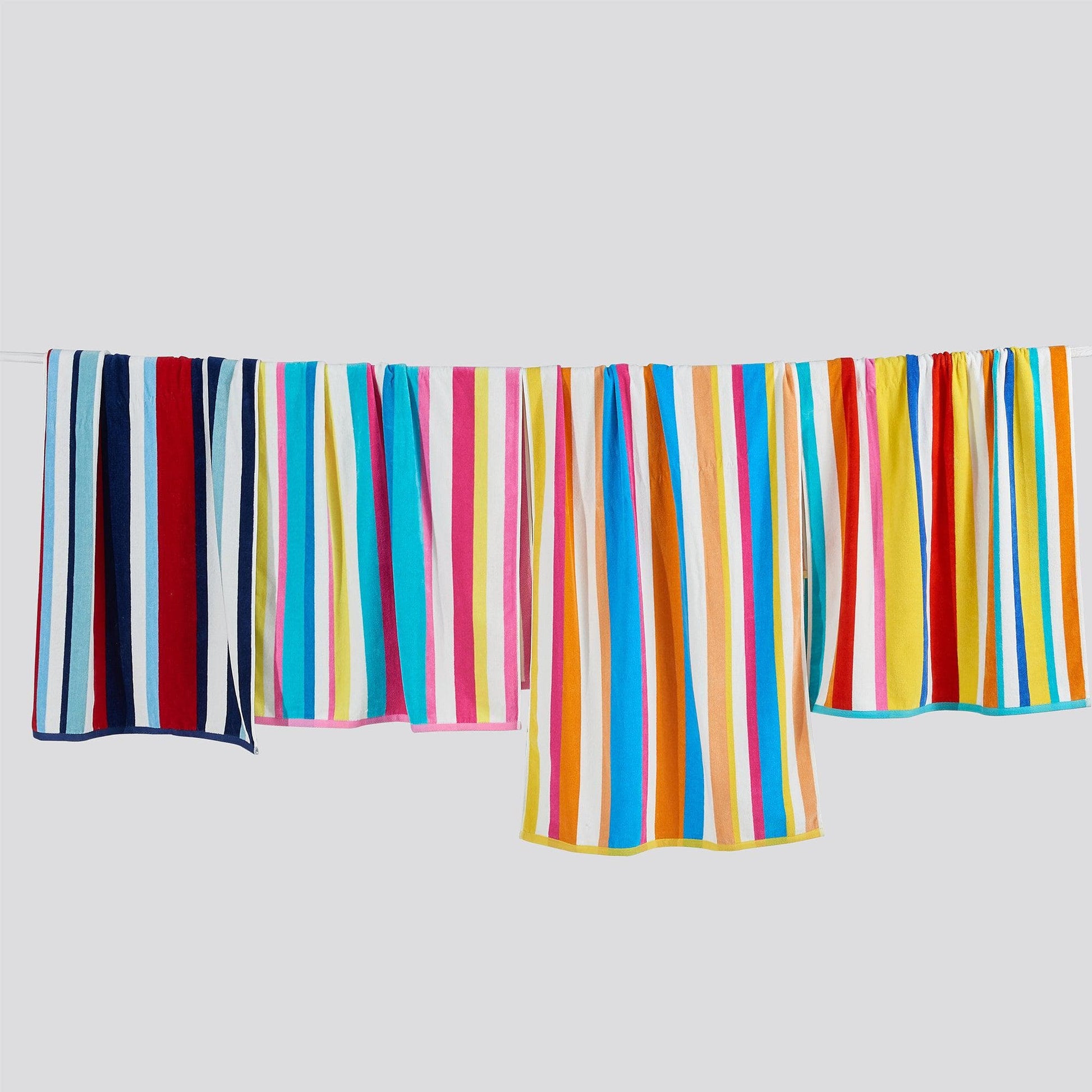 Cotton velour cabana stripe beach towel from the Novia Collection by Great Bay Home, featuring colorful striped design.