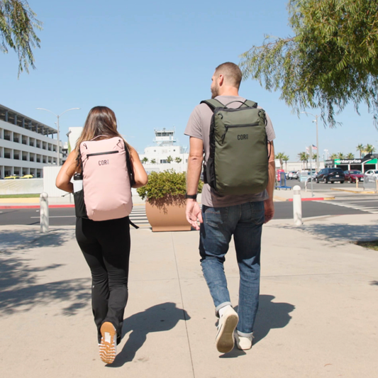 COR Surf Island Hopper 28L travel backpack with multiple compartments and ergonomic straps, designed for convenient airport travel.