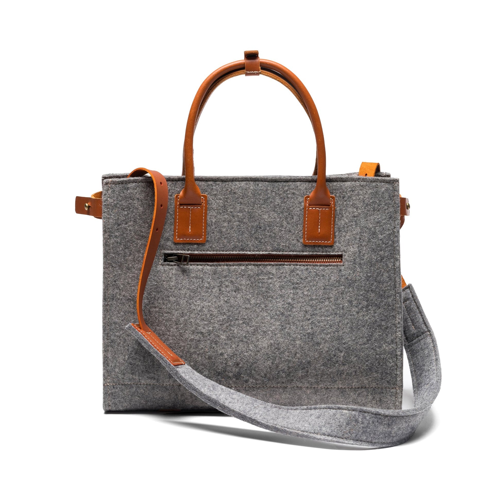 Kyrgies Handmade Wool Handbag featuring a colorful woven design and sturdy leather strap, stylish and eco-friendly accessory.
