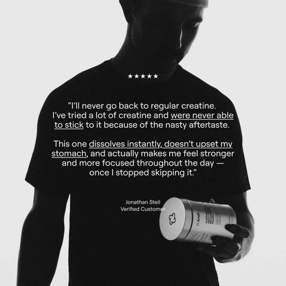 Arq8™ Creatine Monohydrate powder in a container, showing white powder suitable for athletic performance and muscle support.