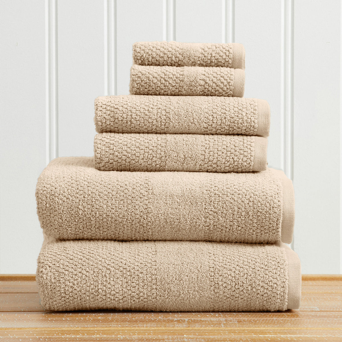 Set of 100% cotton woven texture bath towels from Great Bay Home Marbella Collection, showing soft, plush fabric in neutral tones.