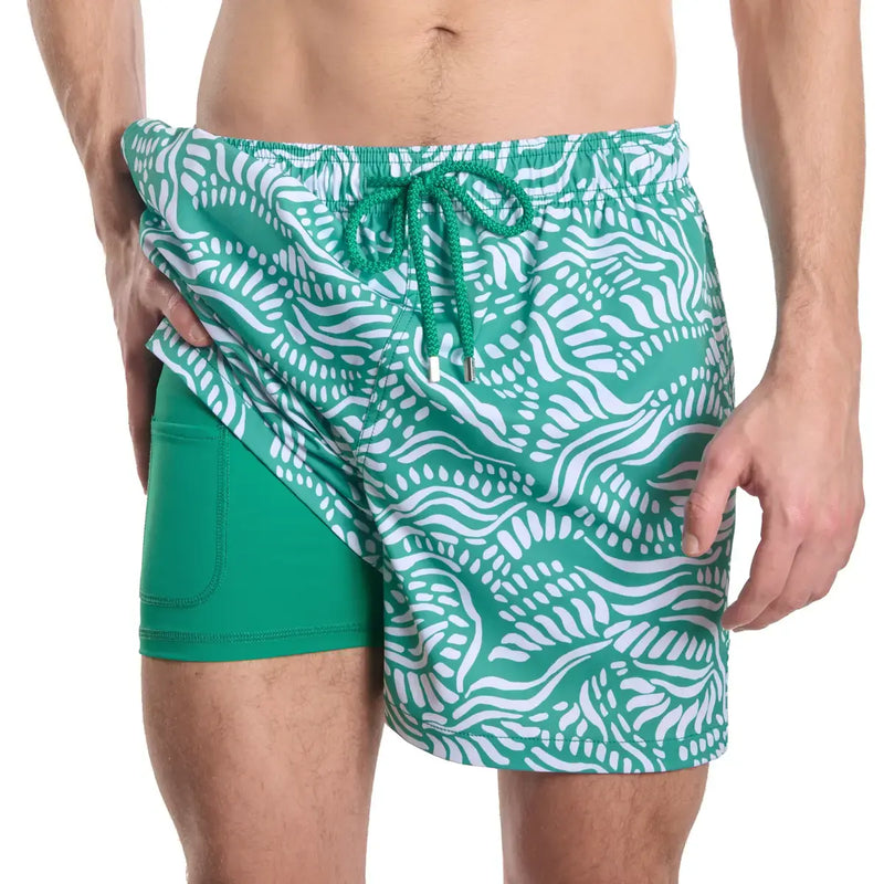 Men’s Capelle Miami hybrid shorts with palm and surf print featuring compression-lined hybrid design and salt spray pattern.