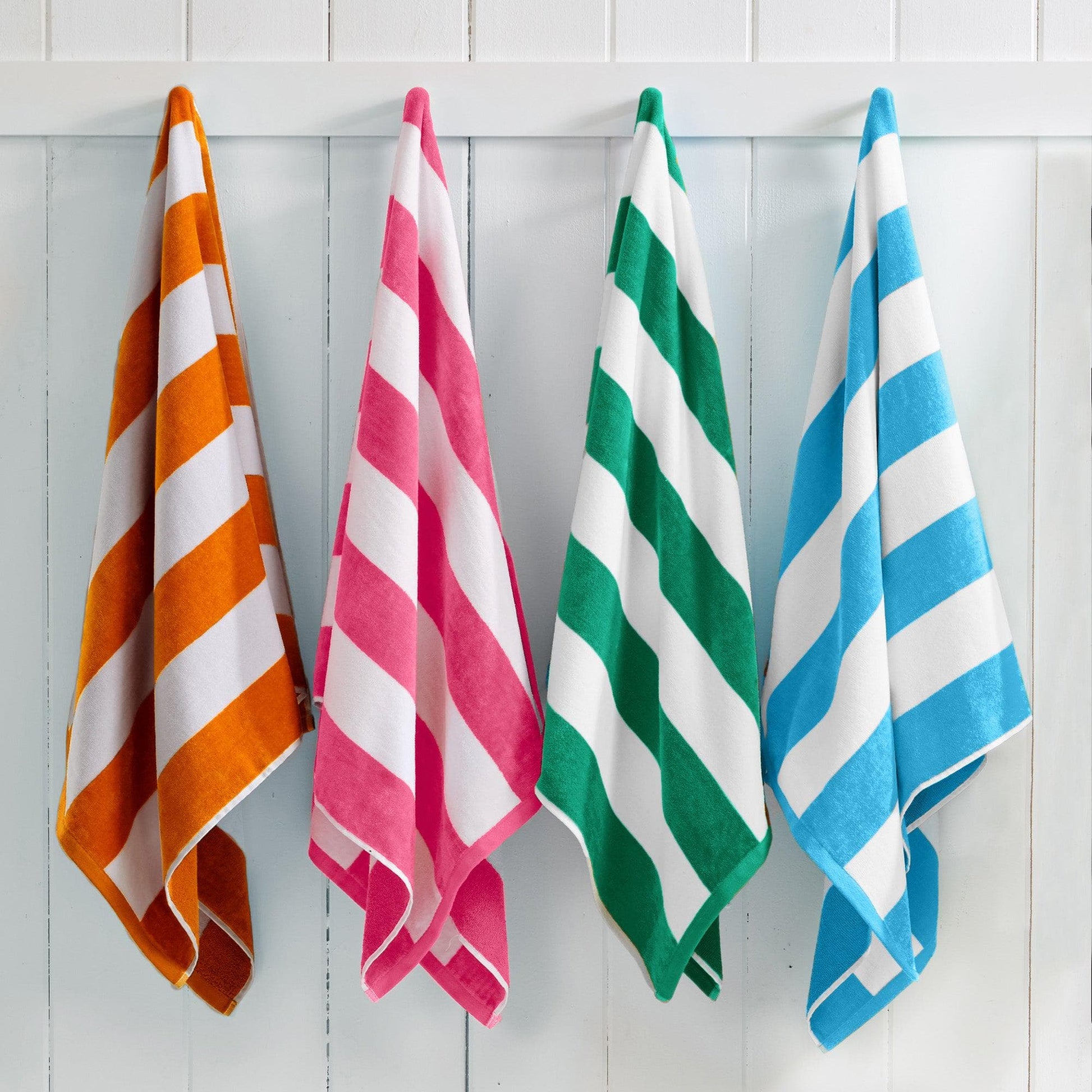 Cotton Velour Cabana Stripe Beach Towel from Great Bay Home's Novia Collection, featuring colorful striped pattern and plush texture.